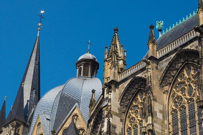 Aachen Scavenger Hunt and Highlights Self Guided Audio Tour - Kreislauf des Geldes and Elisenbrunnen