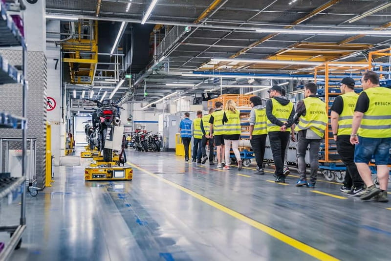 Berlin: BMW Motorrad Production – See How Bikes Are Built - The C-hook system and the moving motorcycle