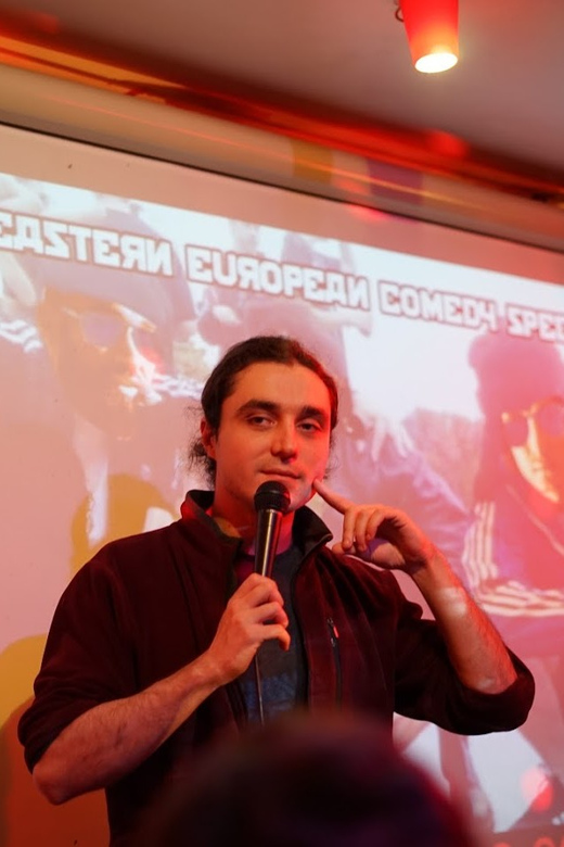Berlin: Eastern European Comedy Special Ticket and Free Shot - Chris, the host, and the room’s social mood