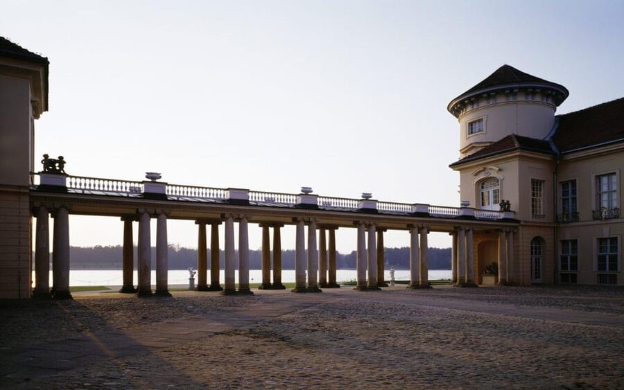 Berlin: Rheinsberg Palace Entrance Ticket - Arriving at Rheinsberg Palace beside Lake Grienerick