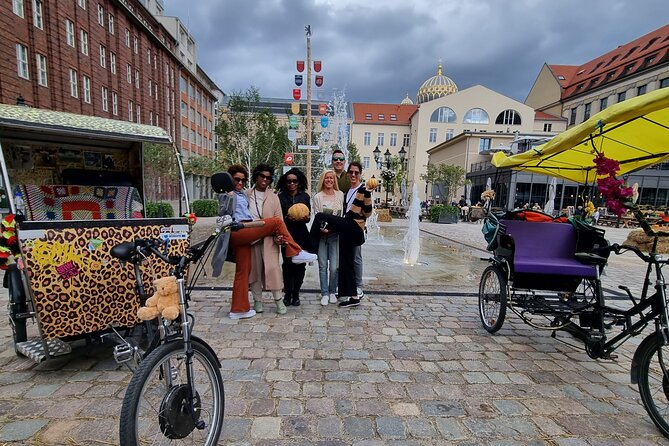 Berlin Rickshaw Tours Historical & Photo City Tour 120min - Sightseeing - A GDR watchtower and Checkpoint Charlie show divided Berlin