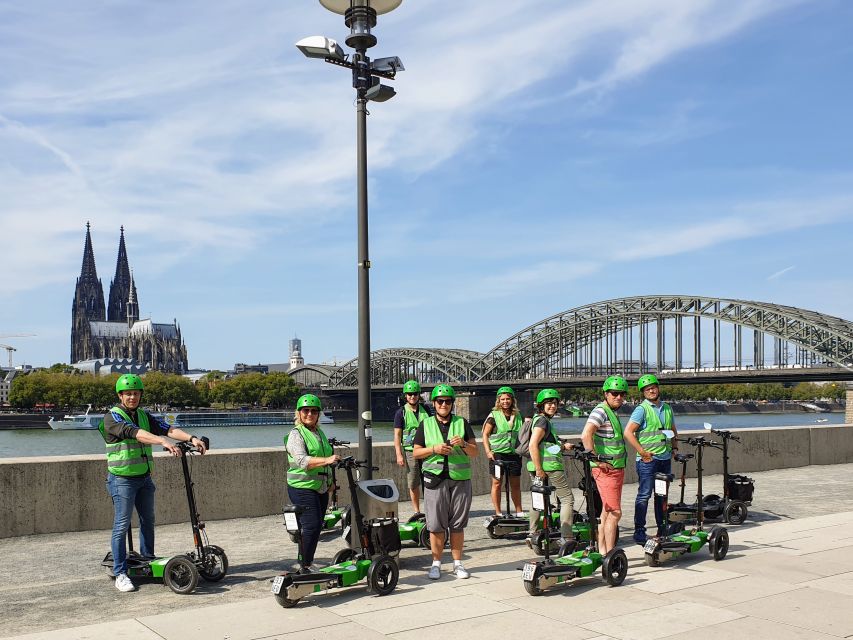 Cologne: Guided E-Scooter Tour - What the guide adds to the ride