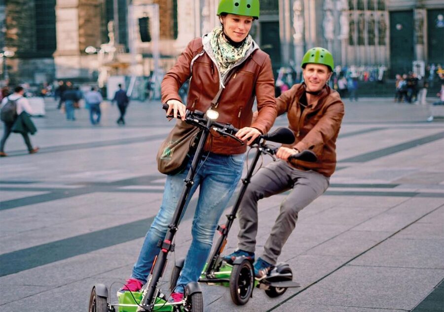 Cologne: Guided E-Scooter Tour - Crossing the Hohenzollern Bridge toward the cathedral
