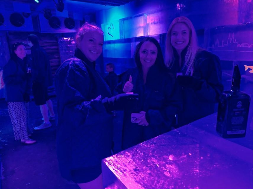 Cologne: IceBar Entry Ticket with Drinks - Getting dressed for the frozen room