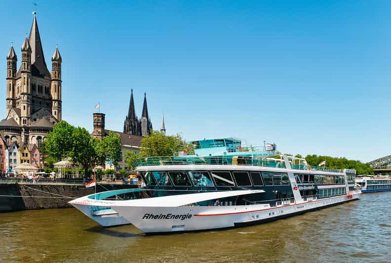 Cologne: Panoramic City Cruise - Leaving the dock beneath Cologne’s bridges