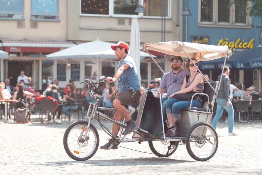 Cologne: Private Rickshaw Tour - Heumarkt and the practical beer stop