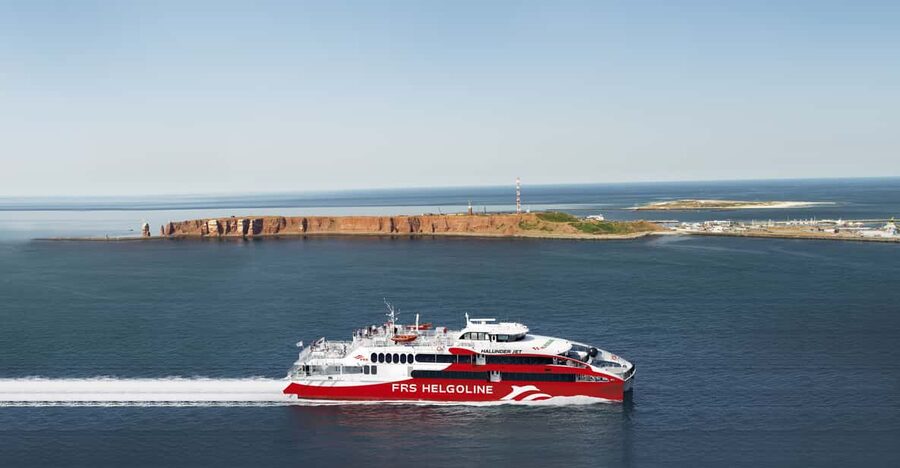 From Hamburg, Brunsbüttel or Cuxhaven: Day Trip to Helgoland - First views of Heligoland’s red cliffs