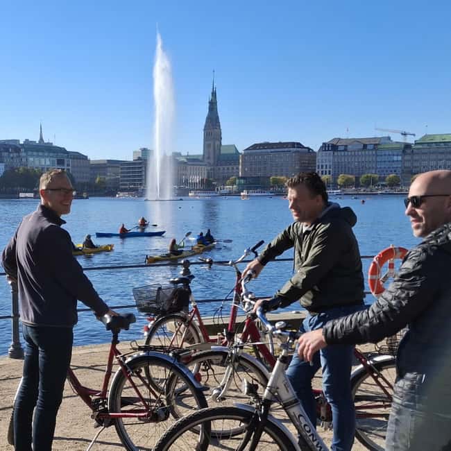 Hamburg: City Tour by Bike with Elbphilharmonie - Speicherstadt, with brick walls over water