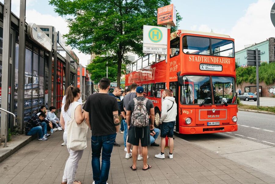 Hamburg: Hop-On Hop-Off Bus with Alster or Harbor Cruise - Audio guides, comfort, and small problems to expect