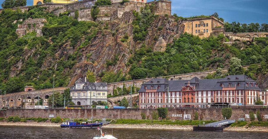 Koblenz: Old Town Tour with the Ehrenbreitstein Fortress - Walking the romantic street between two churches