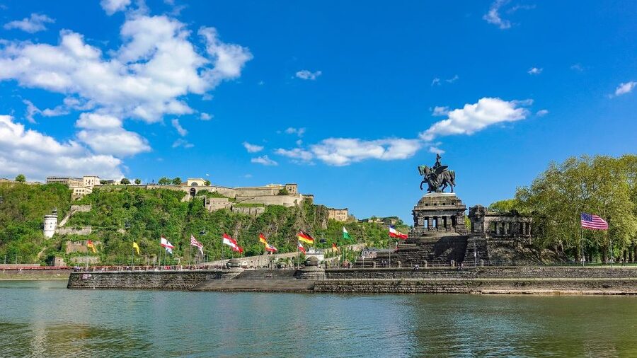 Koblenz: Old Town Tour with the Ehrenbreitstein Fortress - Crossing back for Koblenz’s Roman beginnings at Münzplatz