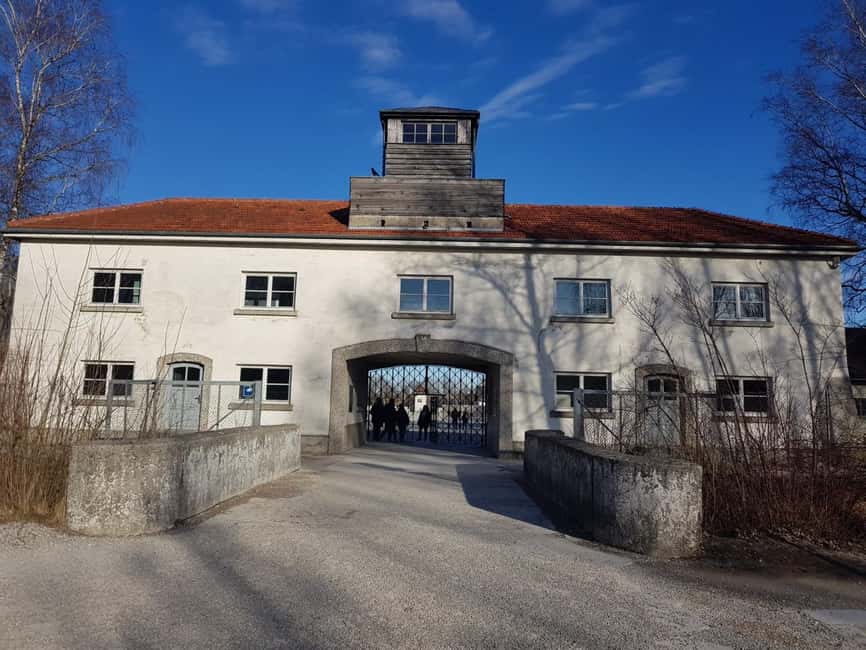 Munich: Dachau Concentration Camp Memorial Site Tour by Car - Barracks, forced labor, and human suffering