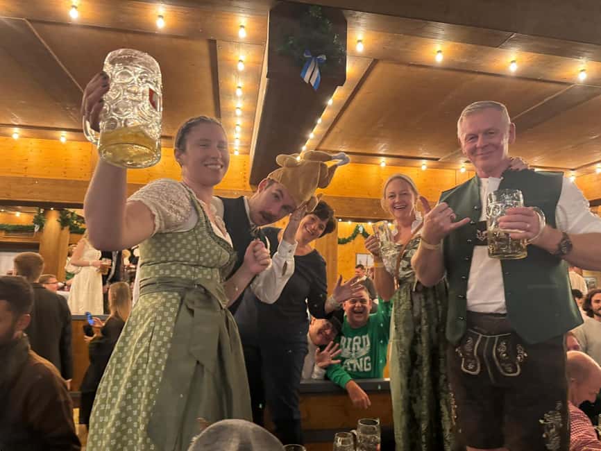 Munich: Oktoberfest Big Beer Tent Evening Table Reservation - Meeting at the traditional clothing shop