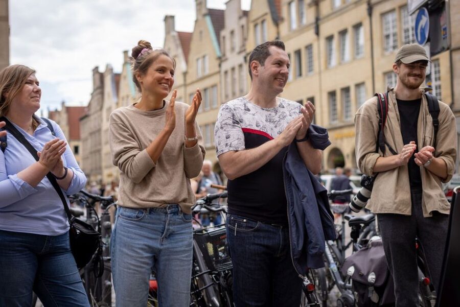 Münster: Old Town Historical Walking Tour by "Geo Epoche" - Historical City Hall and the civic story