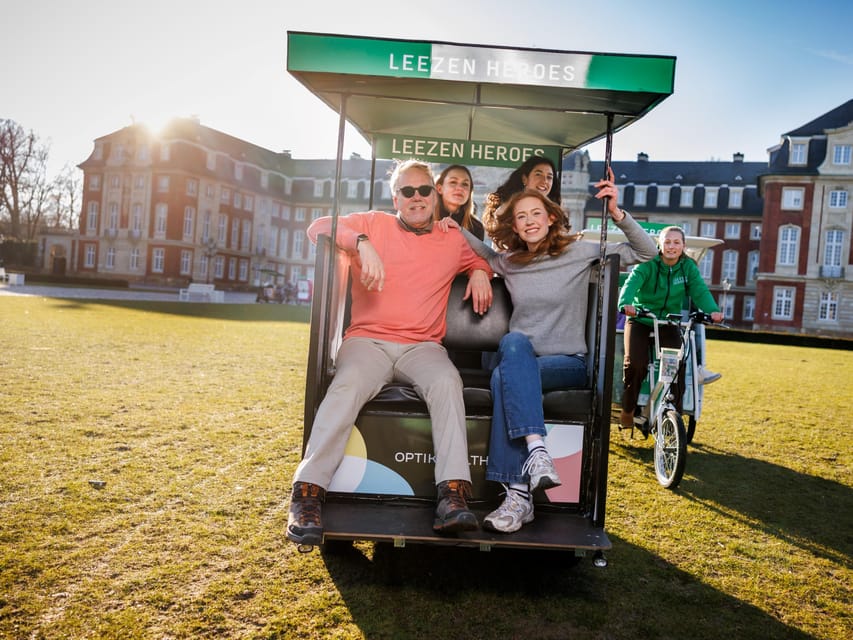 Münster: Private Guided Rickshaw City Tour - Münster Schloss and the city’s grand scale