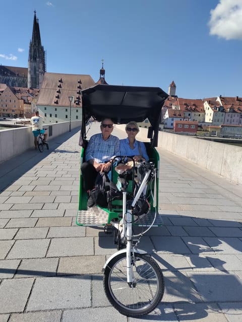 Regensburg citytour rickshaw-pedicab - Goldener Turm and the narrow merchant lanes