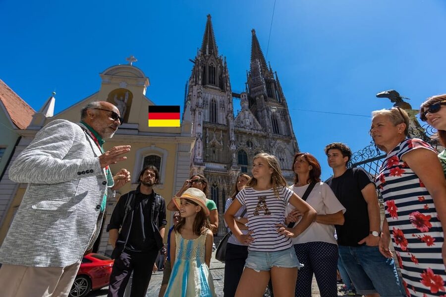 Regensburg: Guided City Walking Tour of the Old Town - Crossing Toward the Old Stone Bridge
