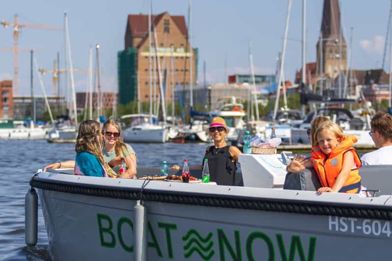 Rostock: Electric Boat Rental on the Warnow River - The harbor views are industrial, not postcard-perfect