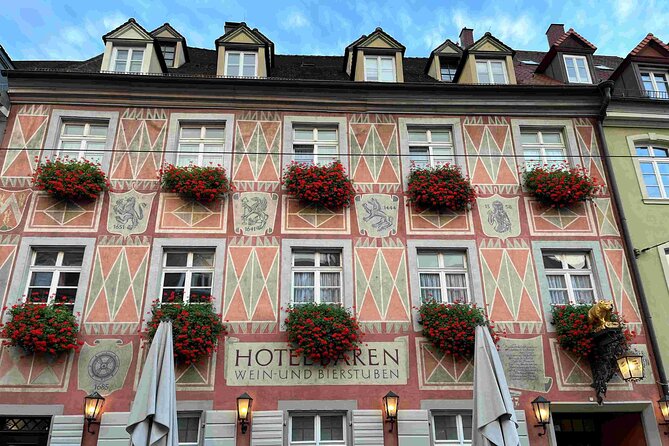 Self Guided Walking Tour through Old Town Freiburg - Red stone and Saint George’s fountain