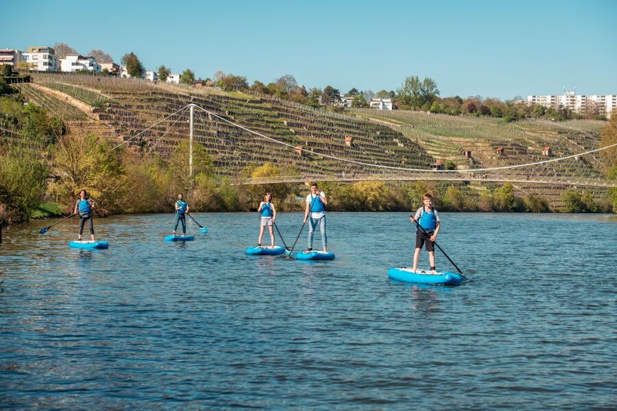 SUP Yoga with Guide - A floating yoga mat on the Neckar